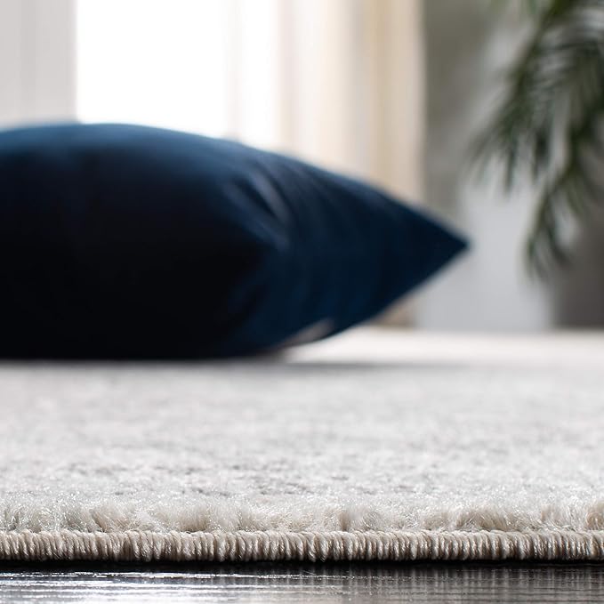 SAFAVIEH Evoke Collection Area Rug - 6'7" Round, Ivory & Grey, Distressed Design, Non-Shedding & Easy to Clean, Ideal for Living Room, Bedroom, Dining Space (EVK256F)