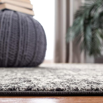 SAFAVIEH Area Rug 9x12 - Evoke Collection - Large - Black & Grey, Distressed Design, Non-Shedding & Easy to Clean, Ideal for Living Room, Bedroom, Dining Space (EVK256R)