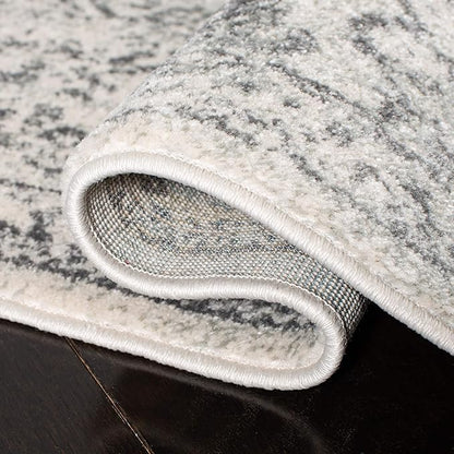 SAFAVIEH Evoke Collection Area Rug - 6'7" Round, Ivory & Grey, Distressed Design, Non-Shedding & Easy to Clean, Ideal for Living Room, Bedroom, Dining Space (EVK256F)