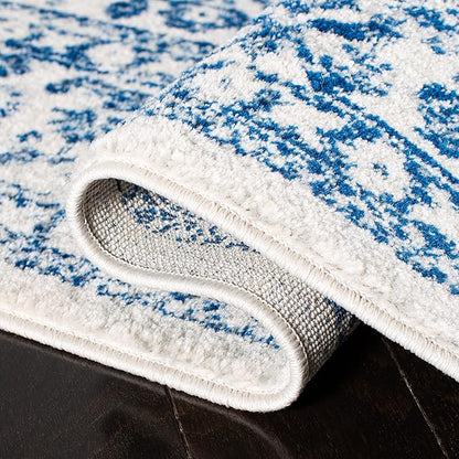SAFAVIEH Evoke Collection 5'1" x 7'6" Ivory / Navy EVK256N Oriental Distressed Non-Shedding Living Room Bedroom Area Rug