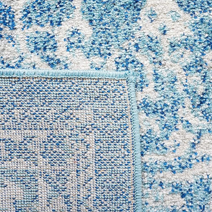 SAFAVIEH Evoke Collection Area Rug - 9' Round, Blue & Ivory, Distressed Design, Non-Shedding & Easy to Clean, Ideal for Living Room, Bedroom, Dining Space (EVK256C)
